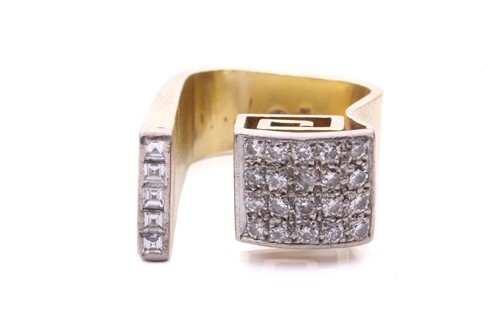 Lot 224 - A modernist diamond ring with a greek key...