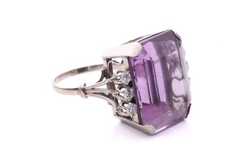 Lot 164 - An amethyst and diamond cocktail ring...