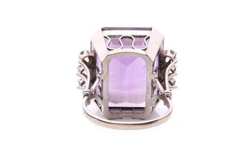 Lot 164 - An amethyst and diamond cocktail ring...