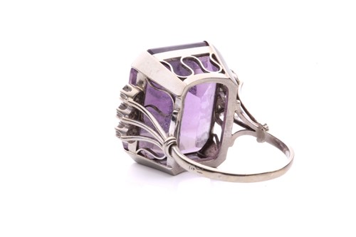 Lot 164 - An amethyst and diamond cocktail ring...