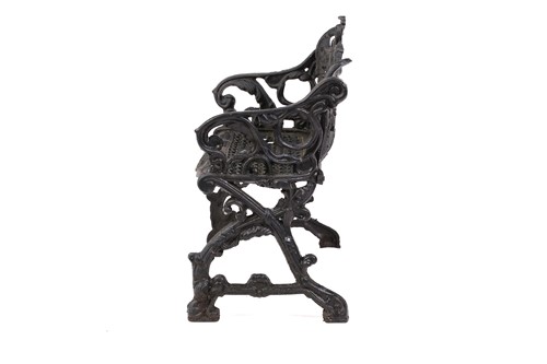 Lot 355 - A large heavy cast iron two-seat garden bench,...