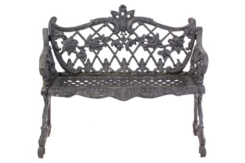 Lot 355 - A large heavy cast iron two-seat garden bench,...