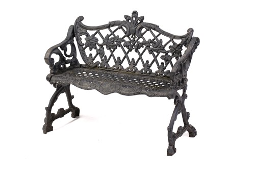 Lot 355 - A large heavy cast iron two-seat garden bench,...