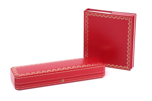 Lot 379 - Cartier - an empty watch box and manual.