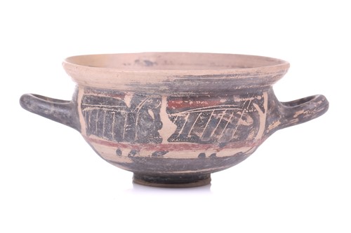 Lot 243 - A terracotta 'Skythos' deep drinking cup, in...