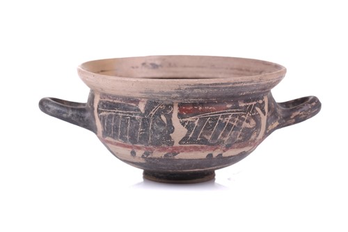 Lot 243 - A terracotta 'Skythos' deep drinking cup, in...