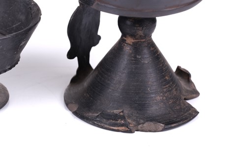 Lot 125 - A group of four Etruscan Bucchero-style black...