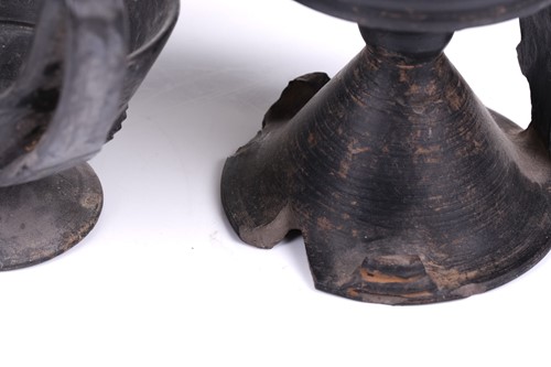 Lot 125 - A group of four Etruscan Bucchero-style black...