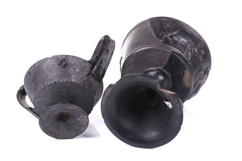 Lot 125 - A group of four Etruscan Bucchero-style black...
