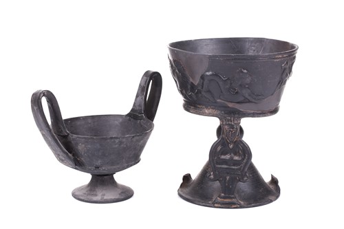 Lot 125 - A group of four Etruscan Bucchero-style black...