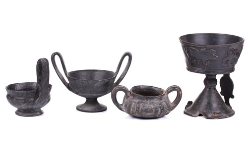 Lot 125 - A group of four Etruscan Bucchero-style black...