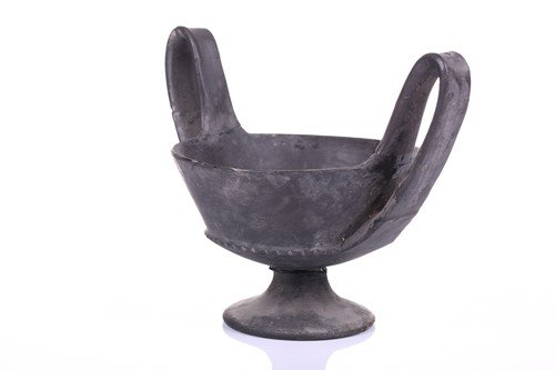 Lot 125 - A group of four Etruscan Bucchero-style black...