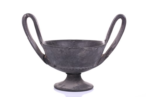 Lot 125 - A group of four Etruscan Bucchero-style black...