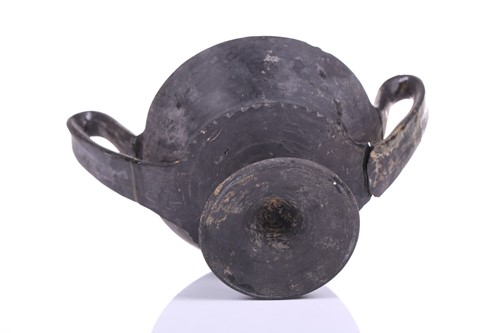 Lot 125 - A group of four Etruscan Bucchero-style black...