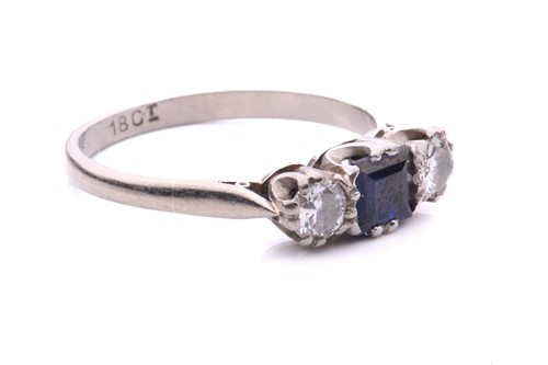Lot 73 - A sapphire and diamond three-stone ring,...
