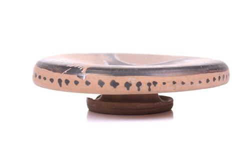 Lot 235 - An Apulian style red-figured fish plate,...