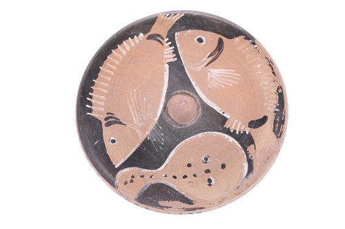 Lot 235 - An Apulian style red-figured fish plate,...