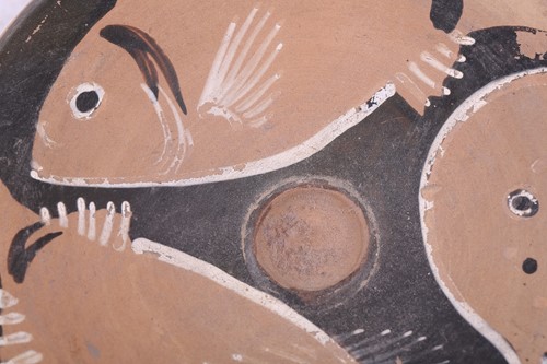 Lot 235 - An Apulian style red-figured fish plate,...