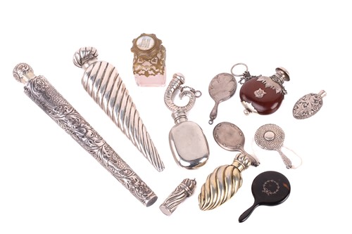 Lot 313 - A collection of silver scent bottles,...