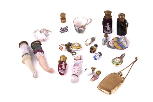 Lot 472 - A collection of miniature porcelain and glass...