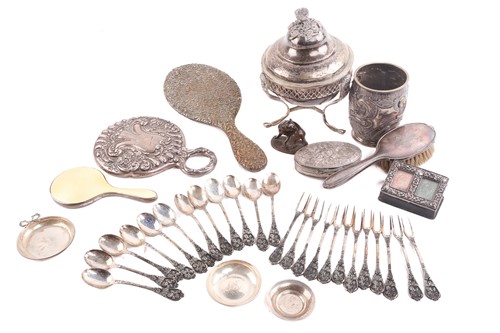 Lot 458 - A collection of silver items including a sugar...