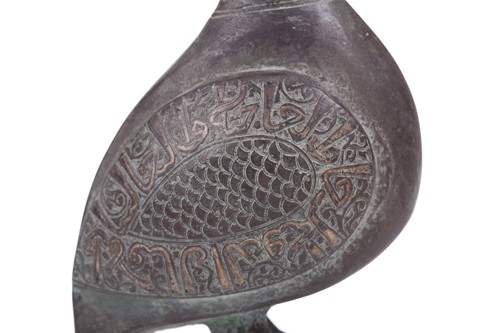 Lot 190 - A Khorasan style bronze bird, Persia, possibly...