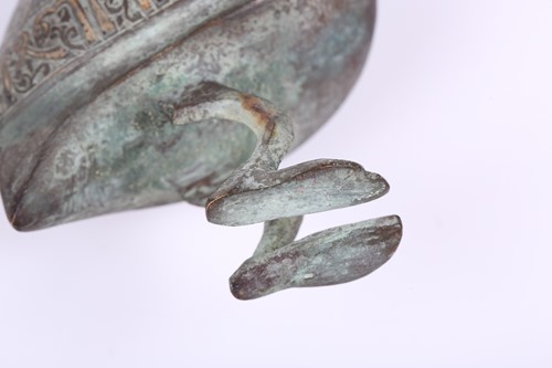 Lot 190 - A Khorasan style bronze bird, Persia, possibly...