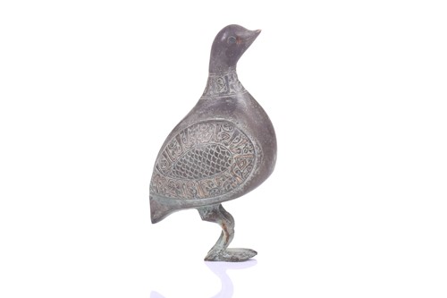 Lot 190 - A Khorasan style bronze bird, Persia, possibly...