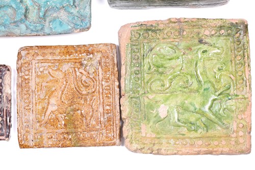 Lot 238 - A group of eight various Islamic tiles, 13th...