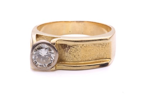 Lot 113 - A Modernist diamond-set dress ring, composed...