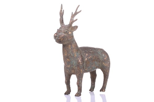 Lot 201 - An Islamic gilt-bronze figure of a deer,...