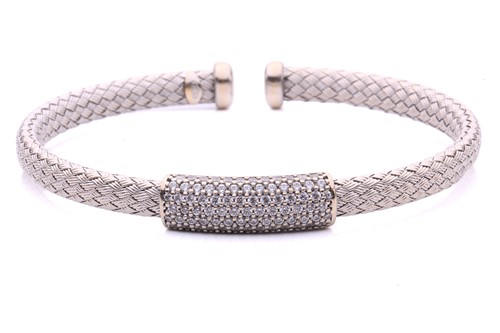 Lot 191 - A wire mesh bangle featuring a central panel...