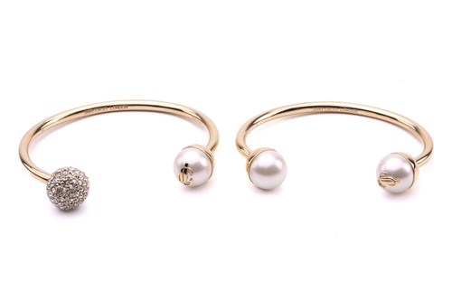 Lot 237 - Two Jimmy Choo cuff bracelets; the first with...