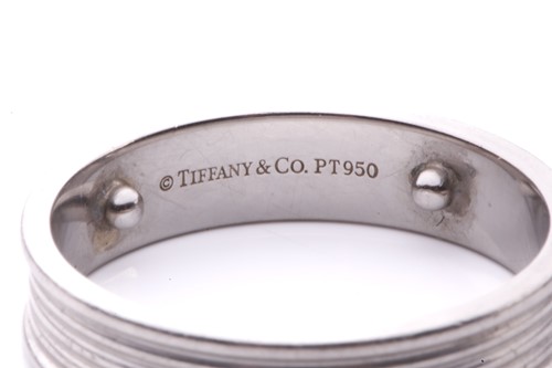Lot 106 - Tiffany & Co. - an '1837' ring and a striated...