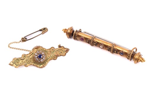 Lot 112 - Two Victorian brooches, the first a bar brooch...