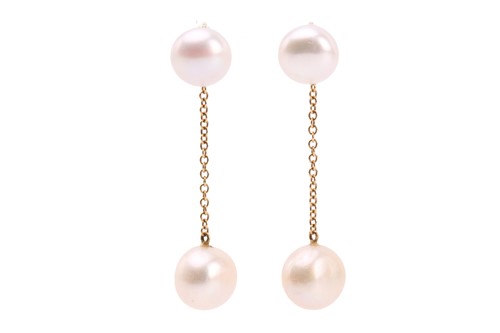 Lot 217 - A pair of pearl drop earrings, each comprising...