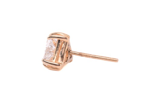 Lot 253 - A diamond stud earring, set with a trillion...