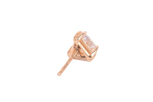 Lot 253 - A diamond stud earring, set with a trillion...