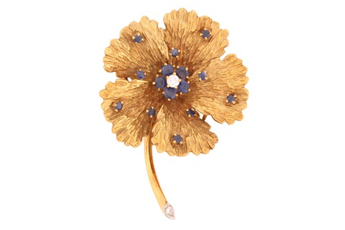 Lot 1 - A sapphire and diamond flower brooch,...