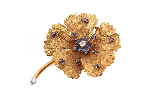 Lot 1 - A sapphire and diamond flower brooch,...
