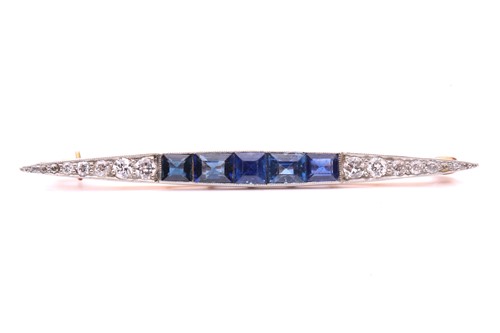 Lot 138 - An Art Deco diamond and sapphire bar brooch,...