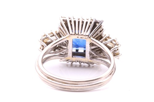 Lot 16 - A sapphire and diamond entourage ring,...