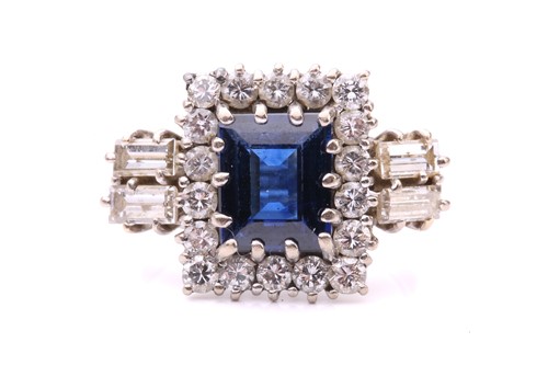 Lot 16 - A sapphire and diamond entourage ring,...