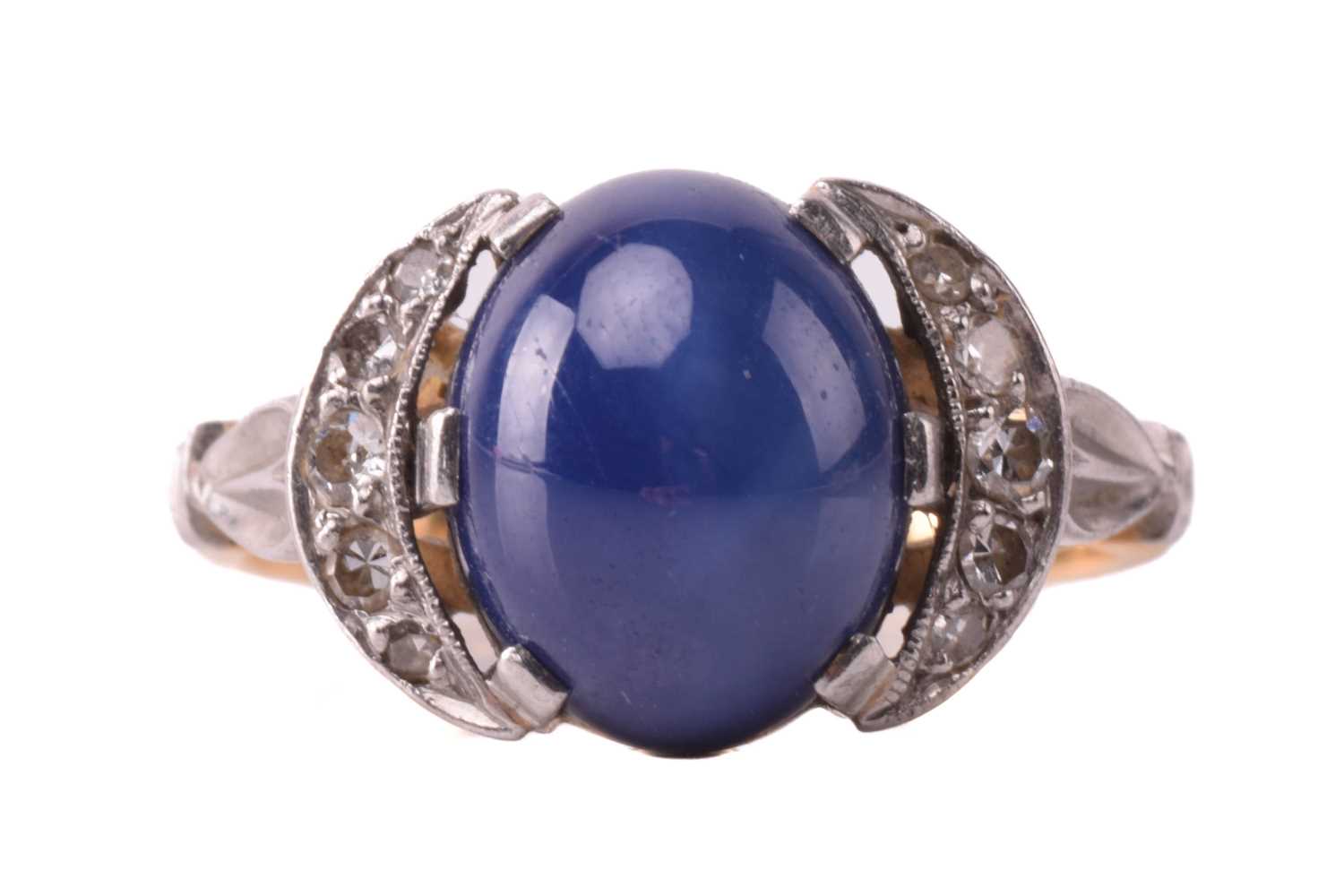 Lot 206 - A synthetic star sapphire and diamond dress...