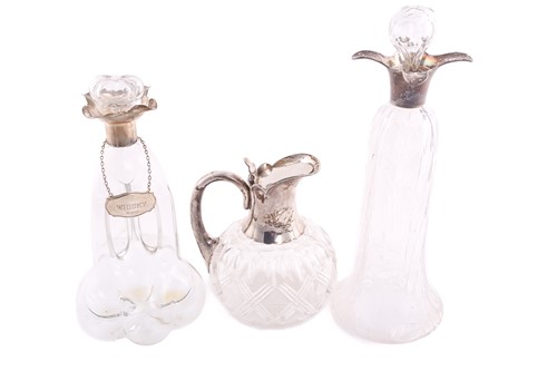 Lot 438 - A Victorian silver mounted claret jug, the cut...