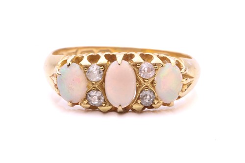 Lot 127 - A Edwardian opal and diamond ring, set with...