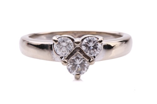 Lot 213 - A three-stone diamond ring, containing three...