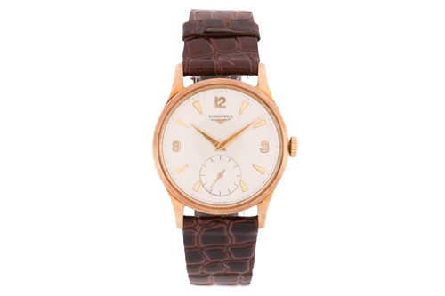 Lot 355 - A Longines 9ct gold dress watch, featuring a...