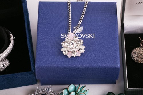 Lot 180 - A Hermatite pearl and gold plated bead...