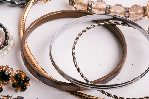 Lot 180 - A Hermatite pearl and gold plated bead...